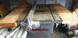 Delta Milwaukee Homecraft table saw with wooden extensions; Delta Milwaukee motor. Motor runs and is