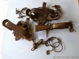 Two Victor No 2 coil spring traps, plus another Victor trap. Larger ones are about 6-1/2