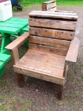 Sturdy wooden chair matches lots 298, 291, and 389. Measures about 31