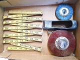 Lufkin 100' steel tape; folding wooden carpenter rule; plastic paint stripper for drill; Stanley