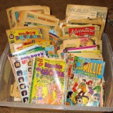 Tote filled with vintage comic books, some have covers missing and are tattered from reading. Titles