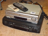 Zenith VHS video player with remote; Zenith Inteq VHS player with remote. Larger unit measures 17
