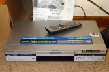 Panasonic DVD video recorder with remote and manual. Seller states that both functions work. Cabinet