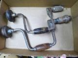 Two vintage ratcheting reversible hand braces, largest is 15