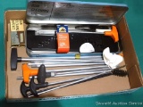 Several rifle and shotgun cleaning rods, plus some supplies.