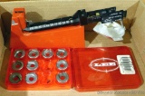 Lee 100 grain reloading scale, reads by 1/10th grain; Lee shell holder set, missing size 2.