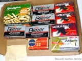 Full and partial boxes of .22LR cartridges, plus a box .17 Aguila - missing one round.
