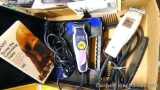 Wahl and Oster pet trimmers, one comes in case. Oster Adjustable clippers run and come with two