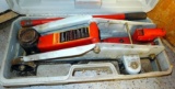 Rolling Larin floor jack comes with handle and case. Approx 19