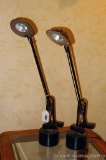 Pair of counter-weighted lamps are each approx. 2' high. Each have low and high, both work.