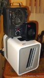 Three electric room heaters by Vornado, Geneva and Soleil. All heat. Largest has a digital display