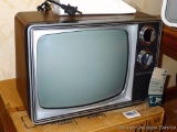 Very vintage new-in-box Zenith black and white television still has original tag. Works.