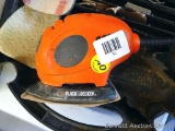 Black & Decker corner sander, works. Comes with extra sanding pads, sanding sheets, and case. Case