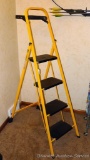 Folding step ladder looks to be near new. Stands 64
