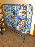 Folding cot with Micronauts cover is very vintage. 39