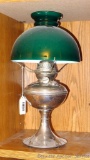 Antique Success brand oil lamp is in good condition and comes with green glass shade, no chimney.