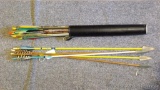 Five cedar arrows with old solid broadheads, two are missing nocks. Quiver full of aluminum arrows.