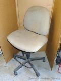 Swiveling office chair is about 21