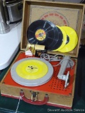 Vintage Electric Phonograph Model 6 is in good shape, comes with extra needles, seven Golden Records