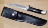Buck 105 USA fixed blade knife with sheath. Knife is 9-1/4