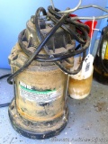 Wayne 1/2 HP cast iron submersible sump pump, seller says it runs. 120v, 60 HZ, 3.8 A. Stands about