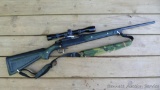 Ruger 77/22 bolt action rifle with 4x32 scope in easy-off mounts. 20
