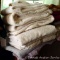 Assorted bath towels in overall good condition.