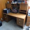 Home office desk is sturdy. Two drawers and door below for storage. Measures 5' wide x 4-1/2' tall x
