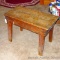 Rustic wooden bench would also make a nice little side table. Measures 28