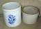 Two unmarked stoneware crocks. Crock with blue floral design stands 8