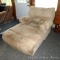 Overstuffed lounge chair has attached ottoman, matches loveseat lot 249. Measures nearly 48