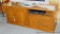 Entertainment cabinet or credenza is in good condition, measures 5' wide x 17