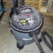 10 gallon wet/dry Shop Vac runs and comes with manual. Includes 5 nozzles and is about 21
