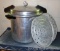 Mirro 22 quart pressure cooker/canner, M-0522. Seal, weight, and two inserts included. No gauge.