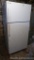 General Electric refrigerator/freezer is currently plugged in and working. Model No. STS16ABSARWW.
