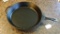 Huge cast iron skillet by Lodge is marked 'USA 14SK'. Skillet has assist handle and measures 15