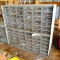 Double storage unit with variety of screws, bolts, fuses, electrical supplies and more. Each unit is