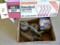 Box of light bulbs; oil filter wrenches; CarQuest 85348 oil filter; metal oil can nozzle.