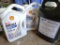 Two partial jugs of Shell Rotella 10W-30 oil; almost full 2.5 gallon container of American Oil