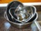 Set of seven nesting stainless steel bowls. Largest is approx. 13-1/2