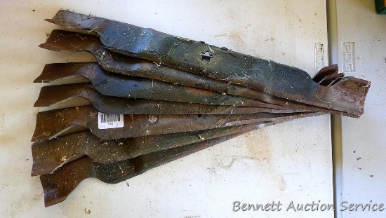 Seven used lawn mower blades 22-3/4" long.