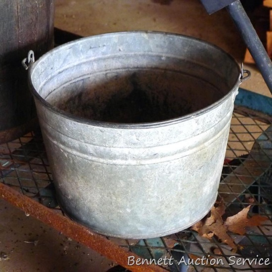 Galvanized steel bucket is 13" across.
