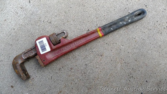 18" heavy duty pipe wrench with good jaws and a straight handle.
