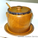 Stoneware soup tureen is marked McCoy 1420L, comes with matching lid, ladle and plate. Tureen is