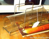 Vintage glass French bread baking tube with rack and original paperwork.