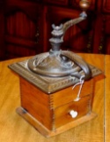 Nice antique coffee grinder with box jointed corners and drawer. Cast iron is all intact and in good
