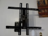 Sanus Vuepoint wall mount for flat screen television. Bring tools to remove.