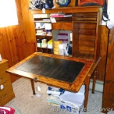Wonderful antique desk with fold down desktop. Desk has tons of storage and a sturdy writing