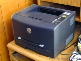 Dell laser printer Model 1710 powers up and looks to be in good condition.