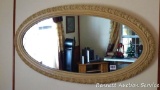 Nicely framed mirror is nearly 4' wide as currently displayed.
